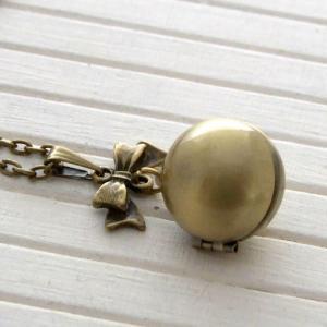 Vintage Brass Ball Locket With Bow